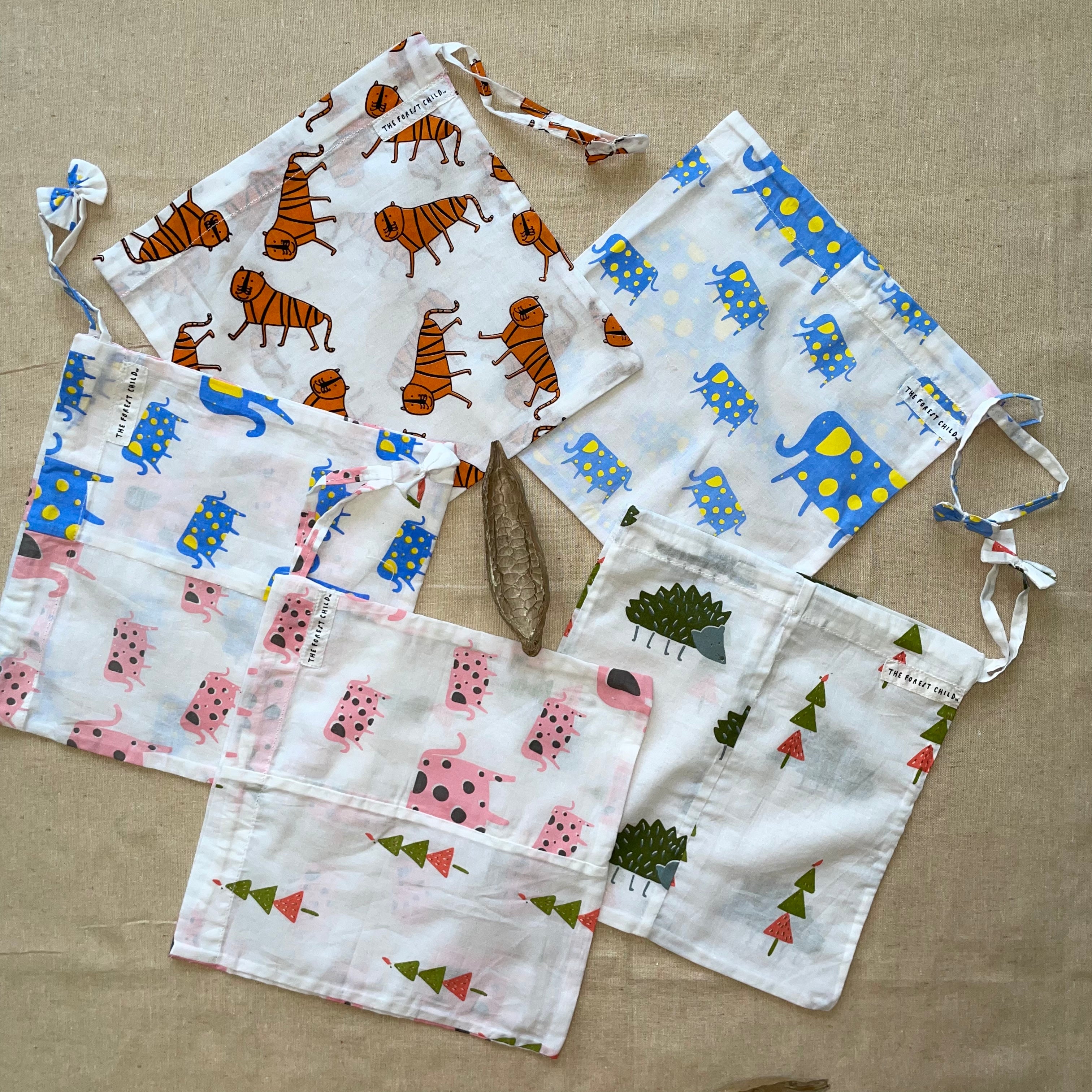 Odds and Ends Drawstring Bags in White